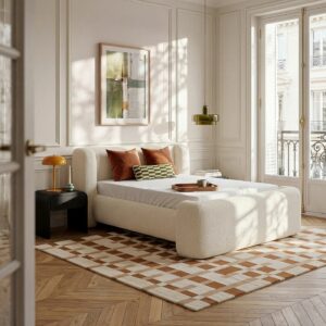 lit ecru dans une chambre moderne