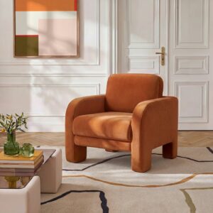 canapé velours terracotta dans un salon moderne